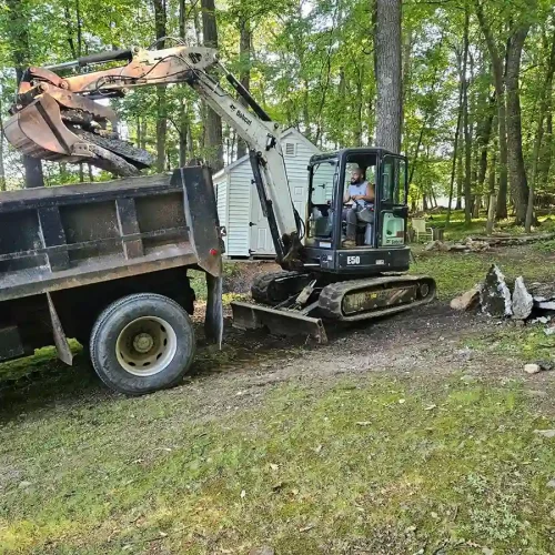 Loading concrete excavating debris